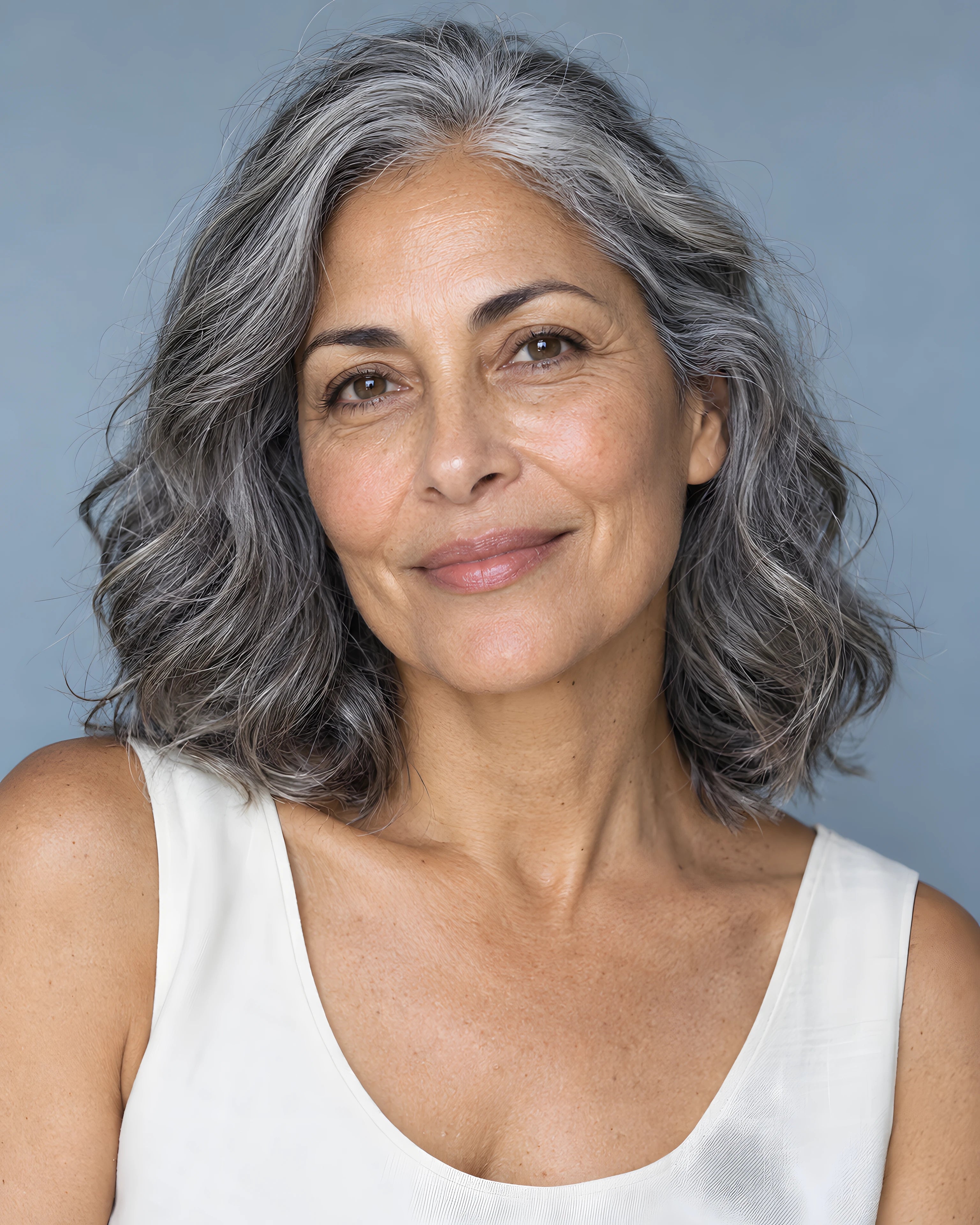 A silver-haired woman with natural skin texture